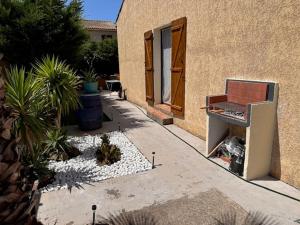 Maisons de vacances La Maison Ensoleillee - Avec jardin et terrasse : photos des chambres