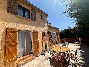 Maisons de vacances La Maison Ensoleillee - Avec jardin et terrasse : photos des chambres