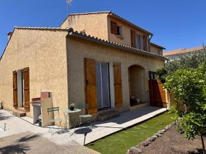 Maisons de vacances La Maison Ensoleillee - Avec jardin et terrasse : photos des chambres