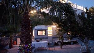 Caravan in Finca Molino in Almayate with with pool, family touch and dog madness