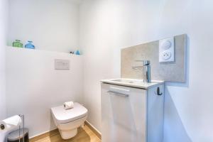 Appartements Appartement Fleuri vue mer - Welkeys : photos des chambres