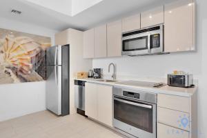 Modern Resort Retreat Steps from the Beach