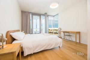 Waterfront Lux | 2BR | AC| Parking By Tilo