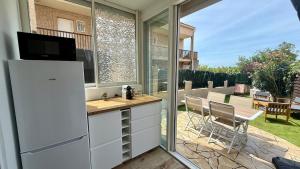 Studio avec jardin parking wifi climatisation