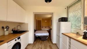 Studio avec jardin parking wifi climatisation