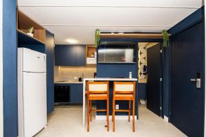 SHB - Studio Grego no Emissário | Pé na Areia