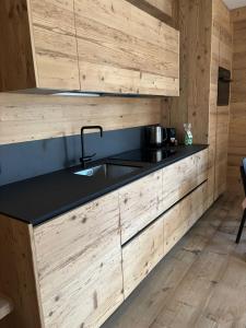 Baita PierIta Stua Genziana e Ginepro