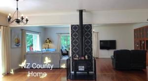 Serene Whangarei lifestyle luxurious modern home with trees and Garden Views