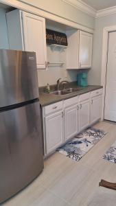 Near Beach Walk and Bike everywhere FENCED BACKYARD