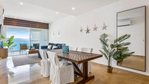 Stylish Oceanfront 2BR - Balcony with Sunset Views, Pools, Beach & Gyms