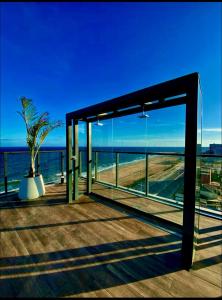 Studio Art - Apartamento climatizado - Prédio a beira-mar, com jacuzzi e piscina - Praia de Armação