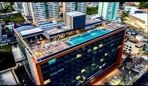 Studio Art - Apartamento climatizado - Prédio a beira-mar, com jacuzzi e piscina - Praia de Armação