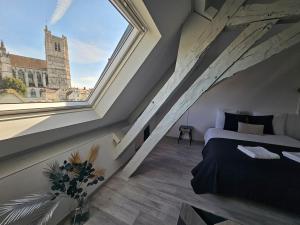 Appartements Aux-Cerfs - Vue imprenable Cathedrale : photos des chambres
