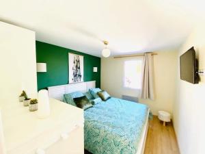 Maisons de vacances tranquillite- jardin- WIFI- gite Pere Louis : photos des chambres