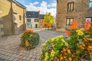 Maisons de vacances Maison dans ilot de verdure : photos des chambres