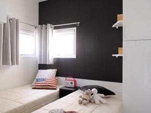 Campings Mobil-home Prestige 4 pers avec Terrasse - API-1-52-159 : photos des chambres