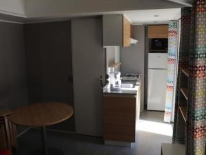 Mobil home 3 chambres avec terrasse - 7 personnes - API-1-52-519