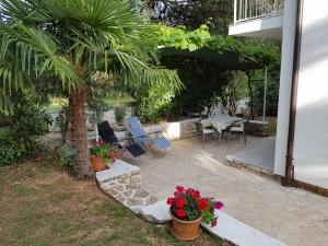 Villa Rosa with yard and childrens playground