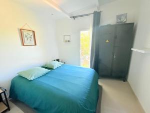 Appartements Maison 10 Cosy T2 avec jardin Jacuzzi : photos des chambres