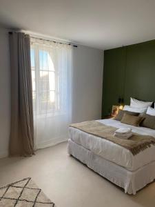B&B / Chambres d'hotes La Maison des Jardins : photos des chambres