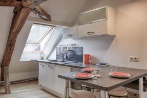 Appartements La-Haut - Wifi - Centre-ville : photos des chambres