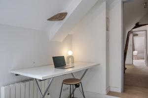 Appartements La-Haut - Wifi - Centre-ville : photos des chambres