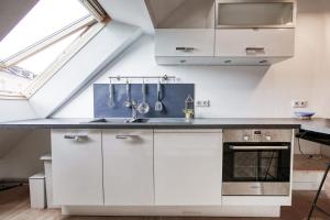 Appartements La-Haut - Wifi - Centre-ville : photos des chambres