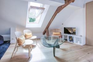 Appartements La-Haut - Wifi - Centre-ville : photos des chambres