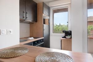 T2 balcon avec parking sécurisé et gratuit