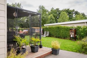 Chalet Hart van Zeeland met overdekt terras & natuur VP086