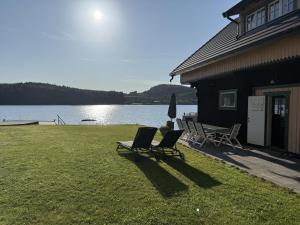 Log cabin with pool, sauna and boat by Torreby Castle