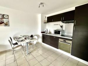 Appartements Etel - T2 moderne 42 m², proche plage, balcon sud, parking prive, animaux admis - FR-1-479-166 : photos des chambres