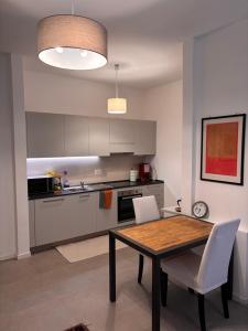 Garden Roots - Carozzi Apartments