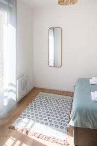 Appartements L-ecrin rose, appartement coeur de ville de Bergerac : photos des chambres