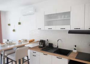 Appartements L-ecrin rose, appartement coeur de ville de Bergerac : photos des chambres