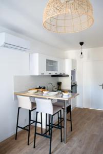 Appartements L-ecrin rose, appartement coeur de ville de Bergerac : photos des chambres