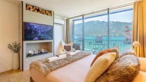 Appartements Le Rivage Alpin, Balneotherapie, Vue lac : photos des chambres