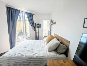 Appartements Grand Appart Paris Chic Central : photos des chambres