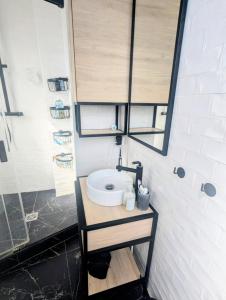 Appartements Grand Appart Paris Chic Central : photos des chambres