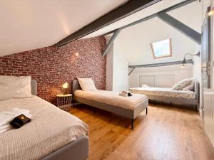 Appartements 9 couchages - Proche Disneyland Paris : photos des chambres