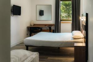 Hotels Aeroport Hotel - Parc Expo : photos des chambres