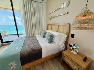 Penthouse con jacuzzi privado, balcón y vista al mar