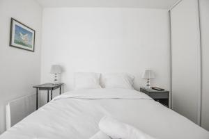 Appartements Le National - Maison de ville avec 3 chambres : photos des chambres