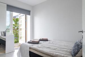 Modern 1BR Home with Sauna & Balcony