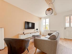 Maisons de vacances Cocon des Moulins, maison de pecheurs avec jardin : photos des chambres