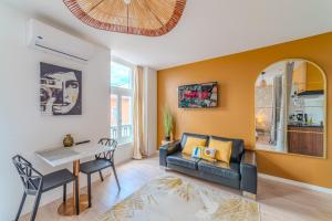 Appartements Mimosa Roanne centre-ville - Parking & Clim : photos des chambres