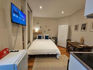 Appartements Aux-Cerfs - Studio coeur de ville : photos des chambres