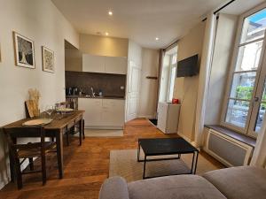 Appartements Aux-Cerfs - Studio coeur de ville : photos des chambres