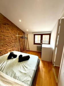 Appartements Ecrin des Carmes T1 Hypercentre : photos des chambres