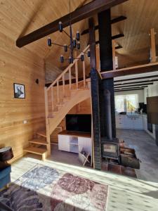 Domek "Pod Laskiem" DomkinadBugiem - jaccuzzi na życzenie, wspólne dla 2 domków